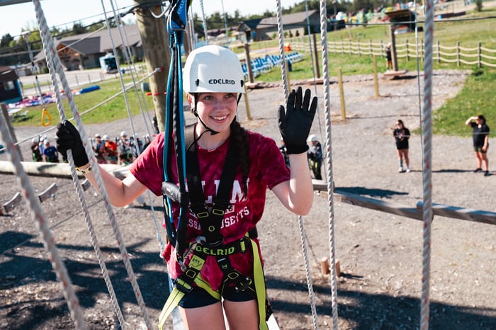 Guests climbing the Bear Paw Ropes Course